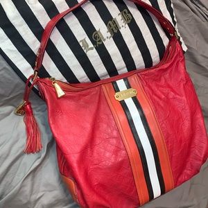 L.A.M.B. Offbeat Berry Leather Hobo Bag. Like New